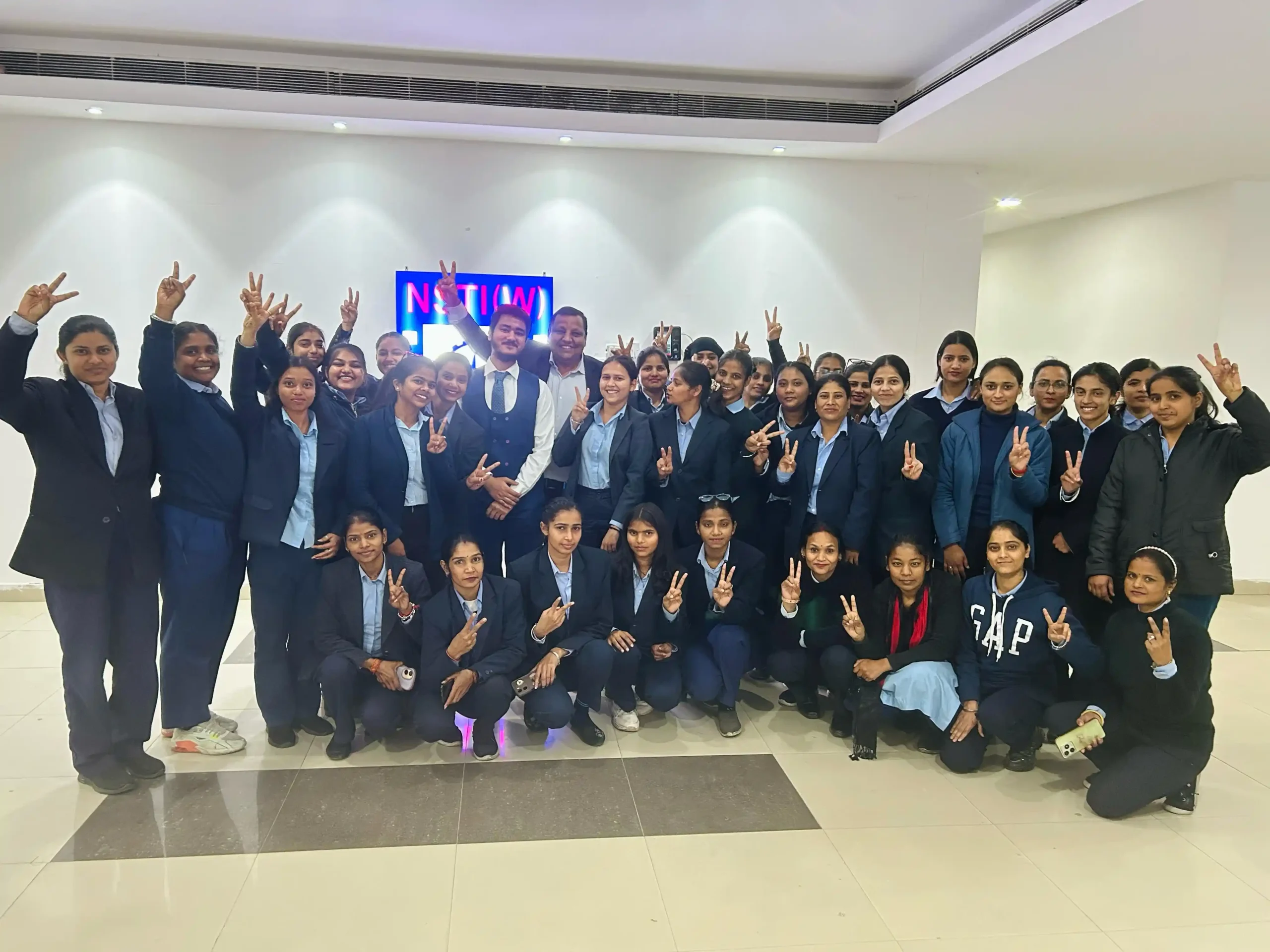 college-students-raising-hands-talentgro
